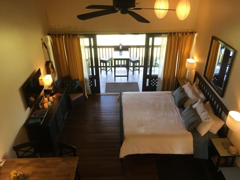 King bed and pendant lights on a dimmer to get them just right.