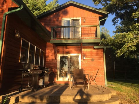 Patio facing the lake. Furniture, lawn chairs, and hammocks not pictured. 