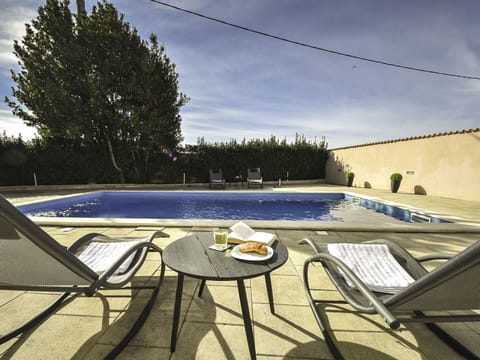 Cloud, Water, Sky, Table, Swimming Pool, Plant, Shade, Outdoor Furniture, Chair, Body Of Water