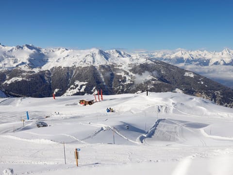 Sky, Mountain, Snow, Slope, Outdoor Recreation, Winter Sport, Terrain, Freezing, Recreation, Sports