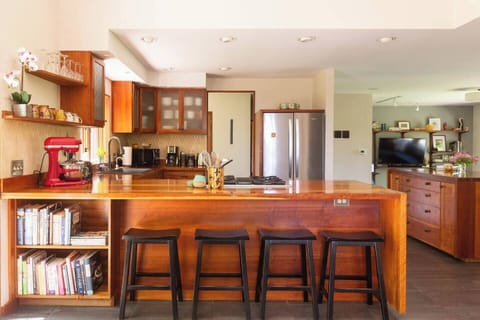 Artist/Designer Doug Sigler made the cherry cabinets. Notice the tight dovetails.