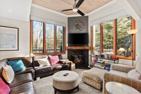 This peaceful end unit has views of the forest behind and lots of natural light in the living room