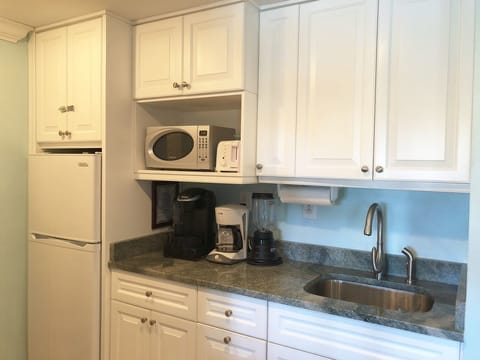 Kitchenette with full size refrigerator, microwave, keurig, toaster, blender