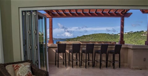 Balcony view from living room with doors open