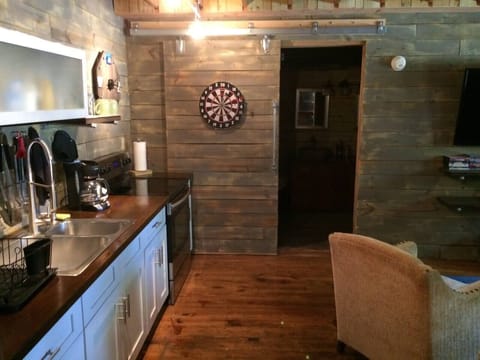 Custom built sliding barn door to bath room and laundry.  