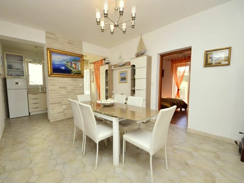 Table, Furniture, Picture Frame, Chair, Wood, Countertop, Lighting, Cabinetry, Interior Design, Hall