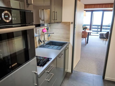 Furniture, Property, Cabinetry, Countertop, Kitchen Appliance, Kitchen Stove, Kitchen, Interior Design, Gas Stove, Flooring