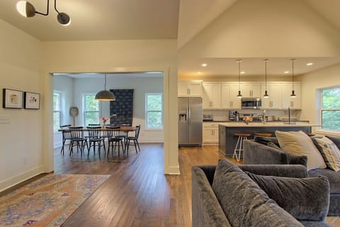 View of the dining room next to the kitchen and living room on the main level