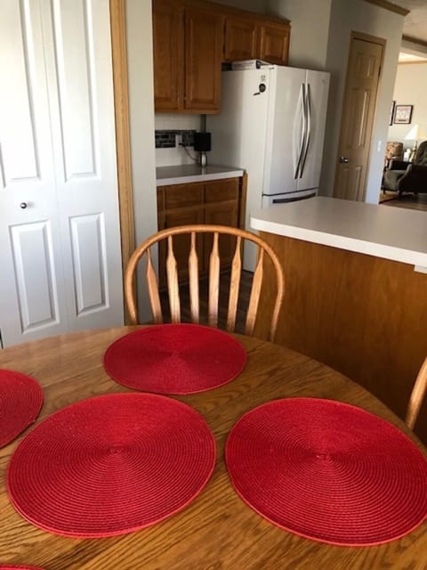 New Whirlpool refrigerator.  Doors on the left hold the washer and dryer.