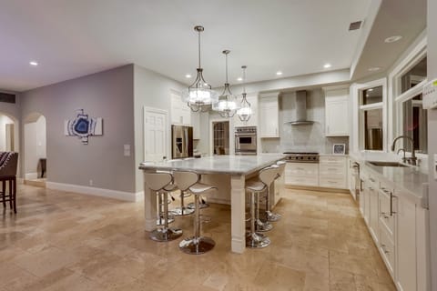 Huge kitchen with a big island to sit around and converse.