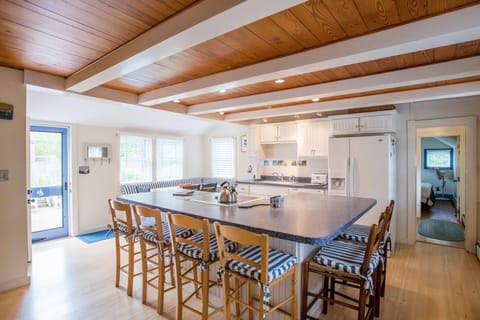 Kitchen seats 11 with countertop and bench seating. High end cookware, blender 