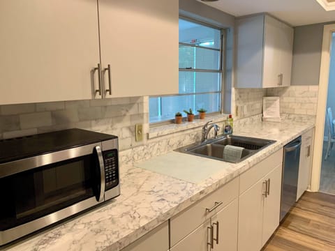 Brand new full-kitchen complete with pocket doors on both sides 