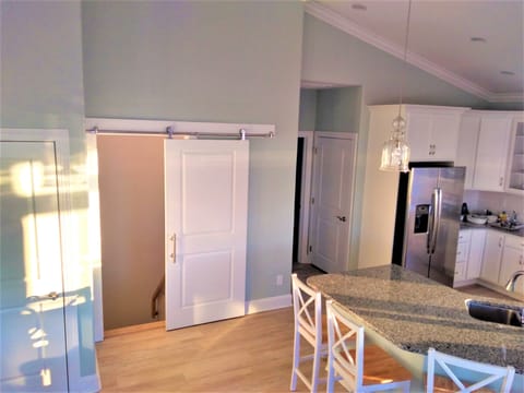 Sliding door allows separation of lower and upper levels for more privacy