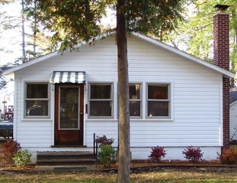 Back of house facing woods 