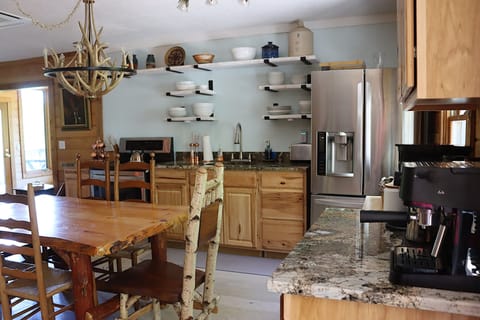 Fully stocked kitchen and coffee bar for the chefs in the family.