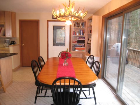 Dining Room:  Feast under the deer antler chandelier