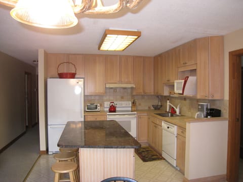 Fully stocked kitchen with granite island