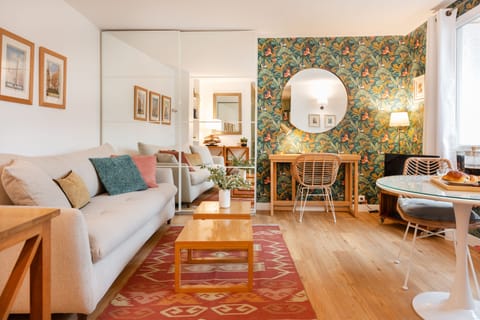 Cosy living area with sofa bed, desk, dining area