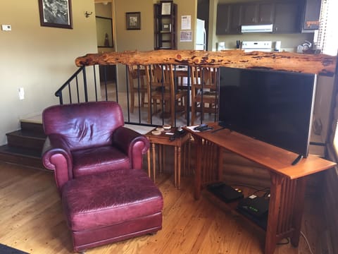 Our cabin has lots of rustic charm with all the modern conveniences! 55" TV, DVD