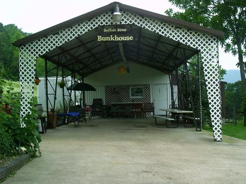 Entrance to Bunkhouse is a large covered pavillion for lounging or parking.