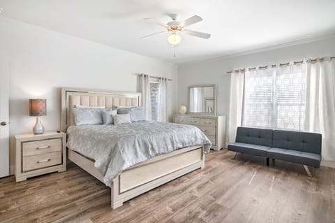King size bed and side sleeper futon.
