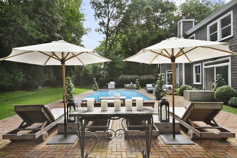 Private Back Yard Setting Surrounded By Walls Of Evergreens