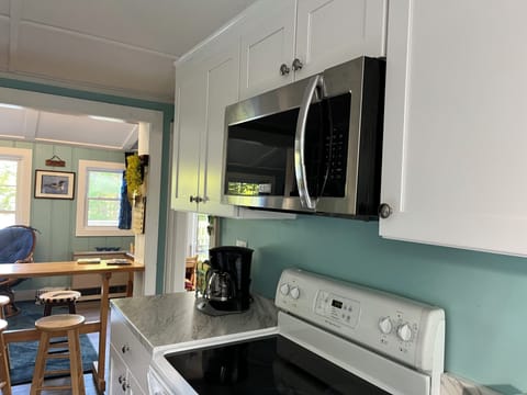 Kitchen equipped with most needed items.