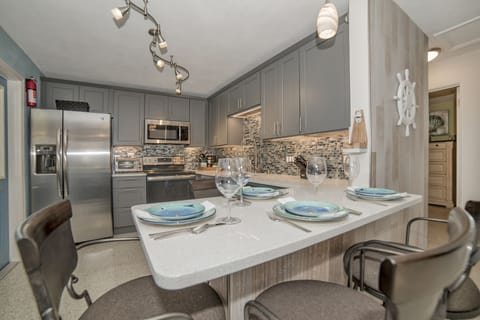 Bar/Table for four brides the living room and Kitchen.  Dimmable mood Lighting. 