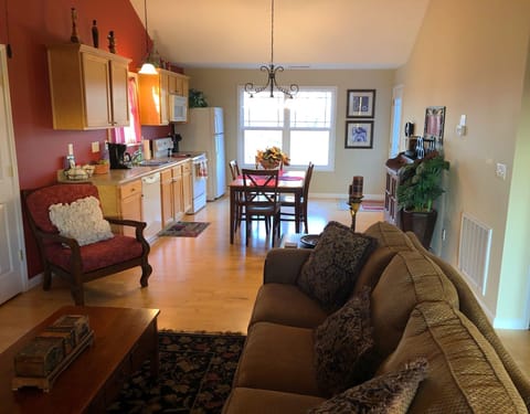 Entering the front door, you'll be greeted by a wide open floor plan & lake view