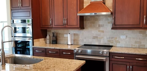 Lots of prep space, granite counters & stainless appliances, all with a view!