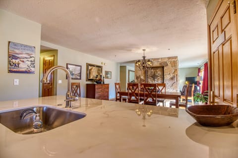 Kitchen, dining, living room  with floor to ceiling windows and oh the views!