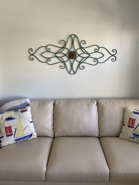 New all leather couch/opens to a new queen bed in Florida room overlooking Gulf