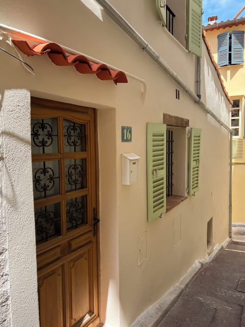 Front door and one side of house