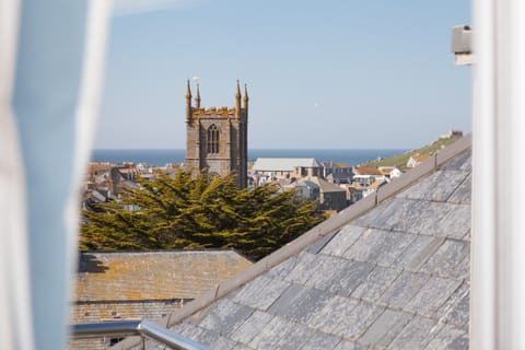 View from top floor balcony towards harbour with the Atlantic Ocean beyond