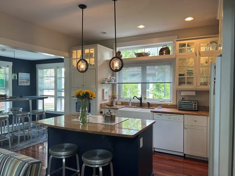 Kitchen with adjacent eating area.