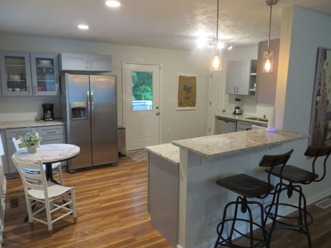 Brand new kitchen opens to the living room. 