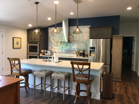 Large open kitchen accommodates multiple cooks and fun family dinners!