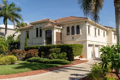 Sand Castle a gorgeous, large four bedroom four bath pool home on the 7th fairway of the Sanibel Golf Club, minutes to the beach.