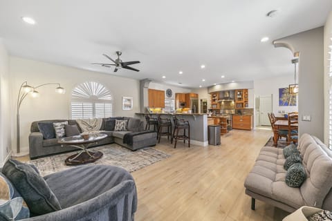 This vacation home opens up to a large living room with a family kitchen.