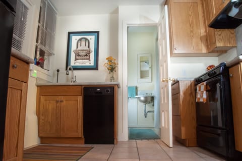 kitchen with view into bathroom