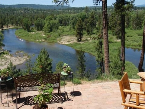 This spectacular home sits on the banks of the beautiful Payette River!