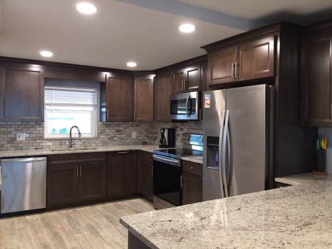 Brand new large kitchen, fully stocked.