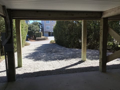 New gravel parking area.  Room for 8 cars under house and driveway.