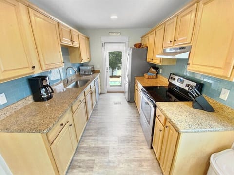Kitchen leading to Screen Porch/Pool