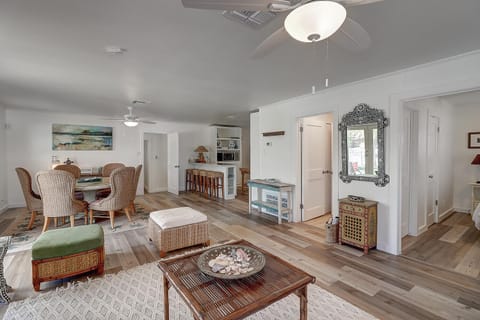 1st Floor - This open dining area flows seamlessly into the kitchen, with extra seating at the island for added convenience and socializing