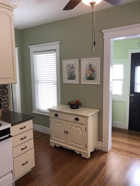 Spacious kitchen with back door to deck and backyard area