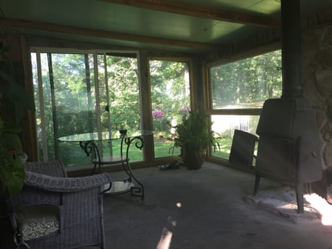Outdoor room with wood burning stove