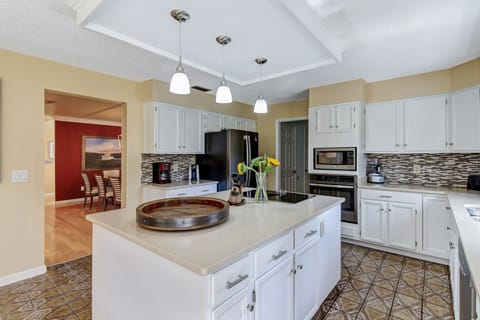 Kitchen looking into formal dining area