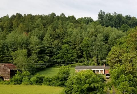 Mountain Time offers unique privacy on 10 acres in City Limits lovely Mars Hill.
