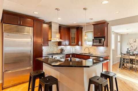 Chef kitchen with Sub-Zero refrigerator, Wolf stove, Bosch dishwasher.